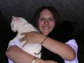 Tanya whilst in Remission enjoying a cuddle from her cats  » Click to zoom ->